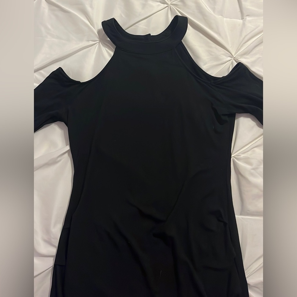 Black long sleeve top with open shoulders by Patty Boutik